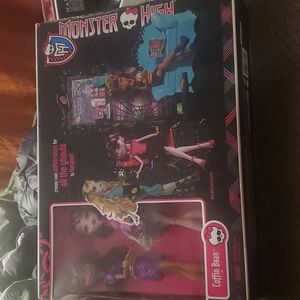 Minster high coffin bean with clawdeen wolf and draculaura dolls
